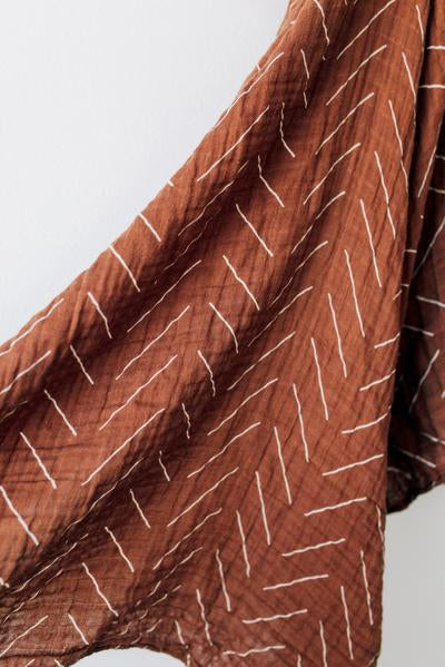 Rust Mudcloth Muslin Swaddle Blanket